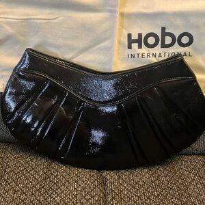 NWT Hobo International pleated black shiny patent leather clutch bag.